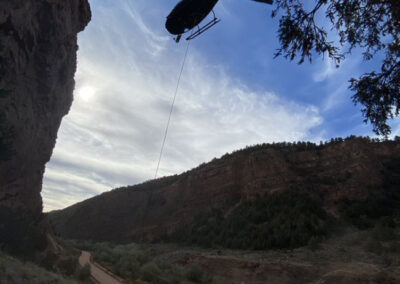 Man holding helicopter line