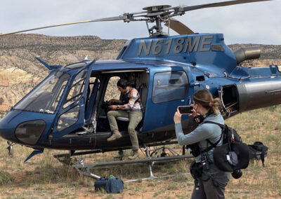 Crew filming on the helicopter