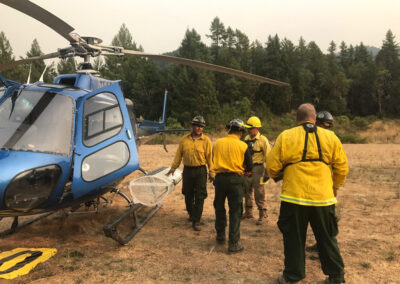 Crew outside of helicopter