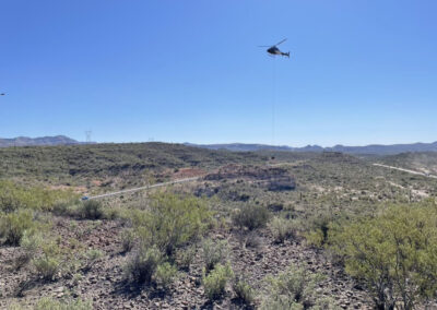 Helicopter in the sky hauling items