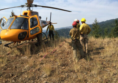 Crew outside of helicopter