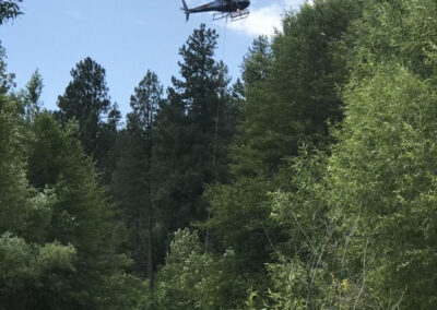 Helicopter in the sky hauling items