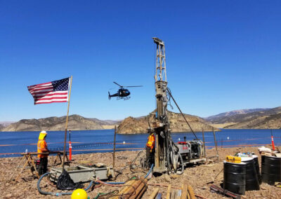 Men on site, surveying the land