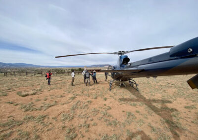 Helicopter with film crew outside