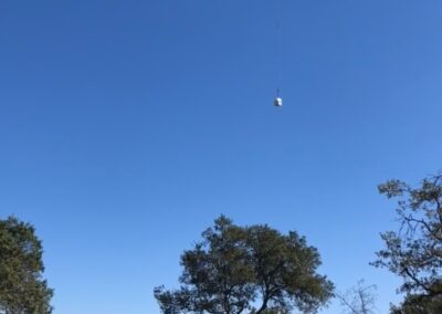 Helicopter in the sky hauling items