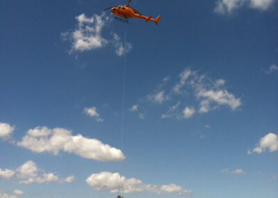 Helicopter in the sky hauling items