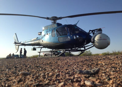 Blue helicopter with filming equipment