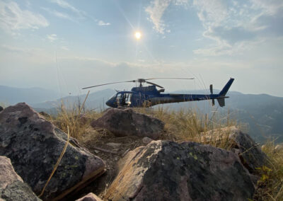 Helicopter on top of a mountain