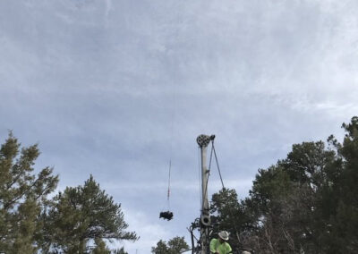 Helicopter in the sky hauling items