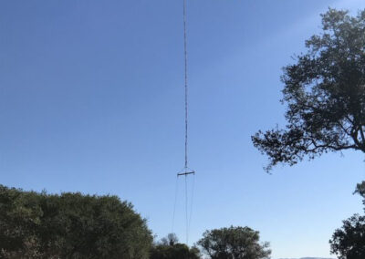 Helicopter in the sky hauling items