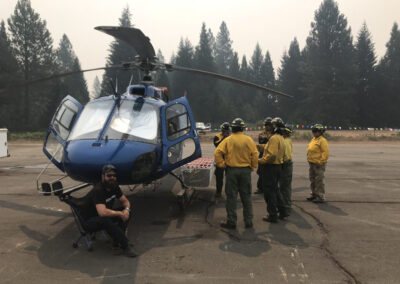 Crew outside of helicopter