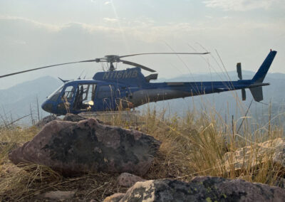 Helicopter on top of a mountain